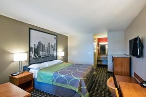Un pat sau paturi într-o cameră la The Hotel 39