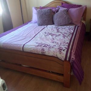 Cama ou camas em um quarto em Hostal Arenas del Mar