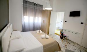 Postel nebo postele na pokoji v ubytování B&B Salernow2
