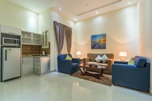 Zona d'estar a Taleen Al Nakheel Apartment
