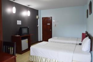 Postel nebo postele na pokoji v ubytování Memory Residence
