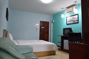 Postel nebo postele na pokoji v ubytování Memory Residence