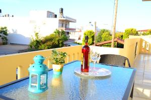 A balcony or terrace at Christina Apartment
