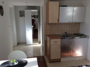 Kuchyňa alebo kuchynka v ubytovaní Maison Brelavista