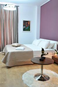 Posteľ alebo postele v izbe v ubytovaní Golden City Hotel & Spa, Tirana