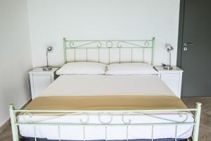 Posteľ alebo postele v izbe v ubytovaní Sunrise Guest House