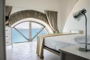 Posteľ alebo postele v izbe v ubytovaní Sunrise Guest House