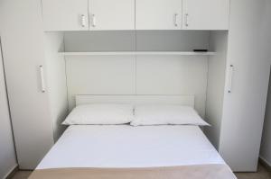 Posteľ alebo postele v izbe v ubytovaní Sunrise Guest House