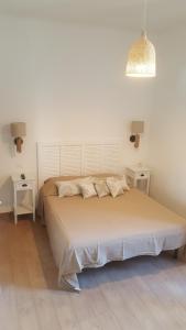 A bed or beds in a room at Affittacamere I Gatti delle 5 Terre