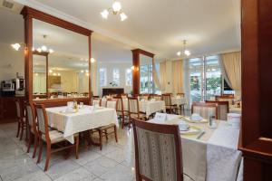 En restaurant eller et spisested på Hotel Villa Bacchus