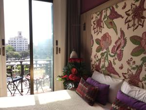 Posteľ alebo postele v izbe v ubytovaní Hotel Ginebra