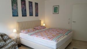 Postel nebo postele na pokoji v ubytování Loft Nagoldtal
