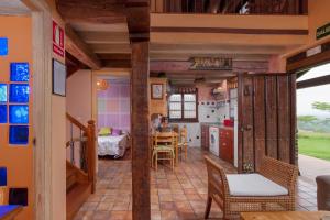 a kitchen and dining room in a house at El Cierruco in Santillana del Mar