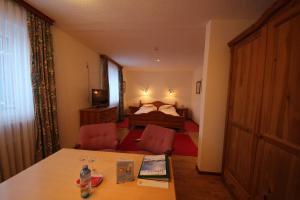 Posteľ alebo postele v izbe v ubytovaní Hotel Garni Lärchenhof