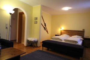Posteľ alebo postele v izbe v ubytovaní Hotel Garni Lärchenhof