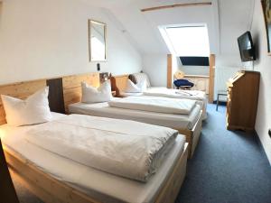 Postel nebo postele na pokoji v ubytování Akzent Hotel Alpenrose