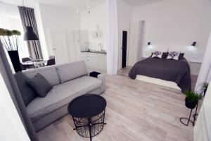 Łóżko lub łóżka w pokoju w obiekcie Apartament Towarowa Kolobrzeg