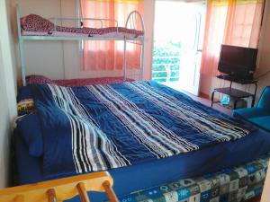 Posto letto in camera con letto a castello. di พักดีโฮม วิวหมอก เขาค้อ a Khao Kho