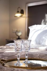 Letto o letti in una camera di Shtarkman Erna Boutique Hotel Nahariya