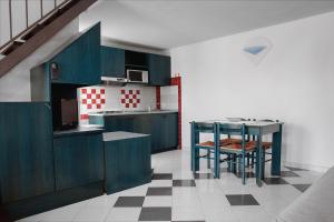 Kuchyň nebo kuchyňský kout v ubytování Residence Verde Mare Official Site