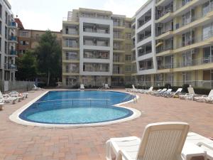The swimming pool at or close to Economy Apartment in Sunset Beach 2 Complex