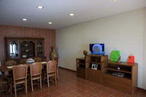 En TV eller et underholdningssystem på Casa do Aido de Cima