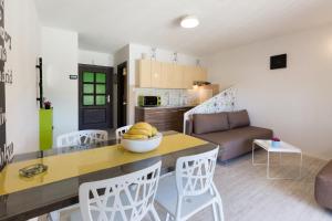 Kuchyň nebo kuchyňský kout v ubytování Apartments & Rooms Laganini