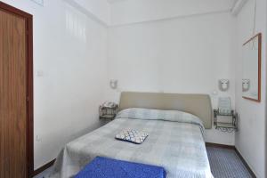 Postel nebo postele na pokoji v ubytování Hotel Europa