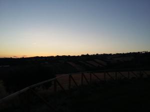 The sunrise or sunset as seen from a panziókat or nearby