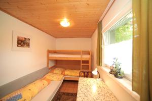 Postel nebo postele na pokoji v ubytování Pension U Kaštanů