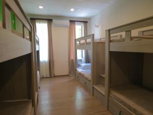 Voodi või voodid majutusasutuse Hostel Your Home toas