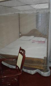 Postel nebo postele na pokoji v ubytování Kalpitiya Guest House