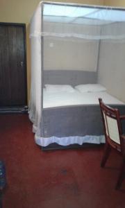 Postel nebo postele na pokoji v ubytování Kalpitiya Guest House