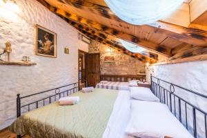 Posteľ alebo postele v izbe v ubytovaní villa sisman + 23 fotografií