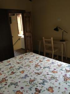 Letto o letti in una camera di Alloggio del Grand Tour
