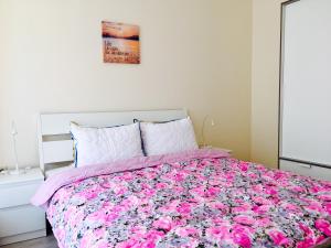 En eller flere senge i et værelse på PSB Apartments in South Bay Beach Residence