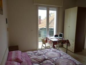 Postel nebo postele na pokoji v ubytování Residence Costablu