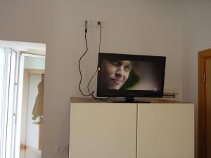 TV a/nebo společenská místnost v ubytování Residence Costablu