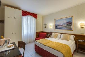 Postel nebo postele na pokoji v ubytování Hotel Silla + 22 fotografií