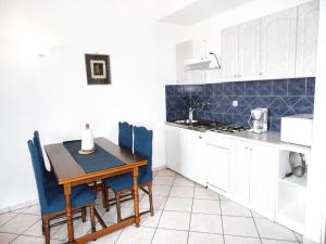 Kuchyňa alebo kuchynka v ubytovaní P&D Apartments