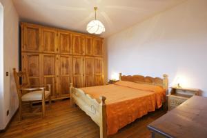 En eller flere senge i et værelse på Rustico Ponte