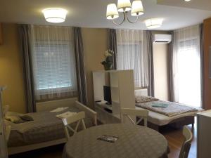 A seating area at Orchidea Apartman Eger
