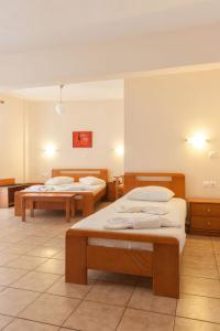 Postel nebo postele na pokoji v ubytování Ageri Hotel