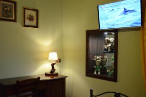 TV a/nebo společenská místnost v ubytování Il Vecchio Pioppo + 37 fotografií