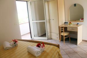 Postel nebo postele na pokoji v ubytování Hotel L'Ancora