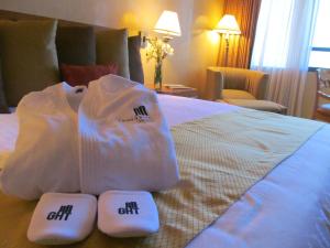 Postel nebo postele na pokoji v ubytování Grand Hotel Tijuana