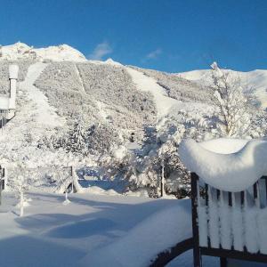 Cabañas Ruca Carel v zimě + 16 fotografií