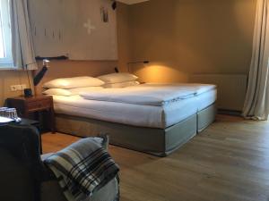Postel nebo postele na pokoji v ubytování Strandhotel Margaretha