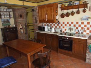 Kuchyň nebo kuchyňský kout v ubytování Chambre d'Hôtes "Au Vigneron"