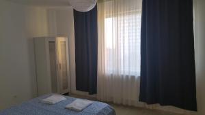 Postel nebo postele na pokoji v ubytování Sara Sea View Olimp